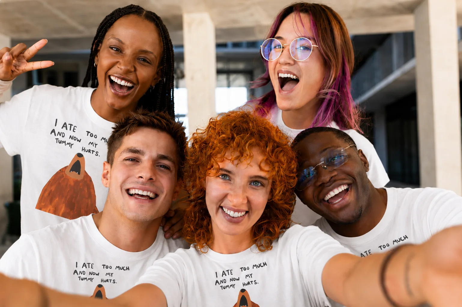 A group of friends wearing SAEBA t-shirts